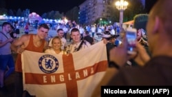 English soccer fans pose for a photo at the official FIFA Fan Fest in Volgograd on June 17. 