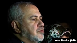 Iranian Foreign Minister Mohammad Javad Zarif speaks to the media after arriving at Viru Viru International Airport in Santa Cruz, July 23, 2019