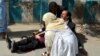Pakistan -- A doctor treats an injured lawyer at the scene of a bomb blast in restive Quetta, August 8, 2016