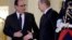 French President Francois Hollande (left) shakes hands with Russian President Vladimir Putin after a summit on the Ukraine crisis at the Elysee Palace in Paris on October 2. 