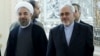 Iranian President Hassan Rohani (left) has handed over responsibility for nuclear negotiations to his foreign minister, Mohammad Javad Zarif (right), perhaps signaling a more flexible approach.