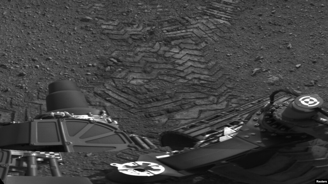 Tracks left by the "Curiosity" on Mars as seen in an image from the rover in late August