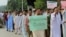 Protesters demonstrate in Islamabad against the lack of security provided to residents of Parachinar on June 27.