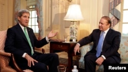 Pakistani Prime Minister Nawaz Sharif (right) met with U.S. Secretary of State John Kerry in Washington on October 20.