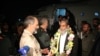 One of five freed Iranian security personnel who had been held by jihadists for a month in Pakistan, is received by military officers and media upon their arrival at an undisclosed location in Iran, November 22, 2018