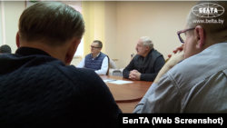Alyaksandr Lukashenka is shown meeting with jailed opponents on October 10.
