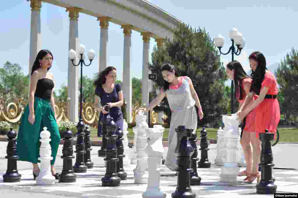 Playing chess in the park.