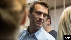 A lawyer for Aleksei Navalny says it is "very strange" to issue a suspended sentence, which means the convict is not jailed, and at the same time order house arrest.