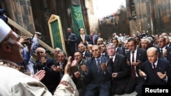 Turkey -- Devlet Bahceli, leader of the Nationalist Movement Party or MHP (R), and provincial party chiefs offer their Friday prayers at an abandoned church-turned-mosque in the historical site of Ani in the Kars province, 01Oct2010