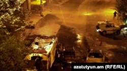 Armenia - A screenshot of police video of a shooting incident outside a Yerevan police station occupied by gunmen, 26Jul2016.