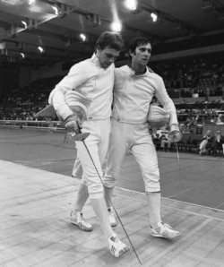 The U.S.S.R.'s fencing gold medalist Viktor Krovopuskov (right) and silver medalist Mikhail Burtsev at the 1980 Moscow Olympics