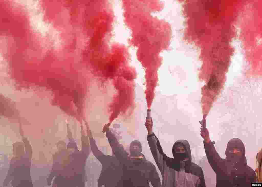 Supporters of Serhiy Sternenko, a Ukrainian civil rights activist and former leader of the far-right radical group Right Sector in the southern city of Odesa, hold a rally outside the presidential administration after a court in Kyiv sentenced him to seven years and three months in prison on February 2. (Reuters/Gleb Garanich)