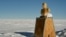 The Pole of Inaccessibility -- licensed for RFE/RL websites -- licensed for RFE/RL websites -- a bust of Lenin is visible on the top of the chimney of former Sovite polar station. 