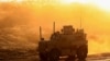 A U.S. army vehicle supporting the Syrian Democratic Forces (SDF) is seen in Hajin, in the Deir Ezzor province, December 15, 2018