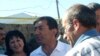 Armenia -- Opposition activist Zhora Sapeyan (C) is greeted by friends outside a prison in Artik, 29July 2010.