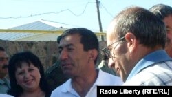 Armenia -- Opposition activist Zhora Sapeyan (C) is greeted by friends outside a prison in Artik, 29July 2010.