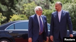  The European Union's foreign policy chief Josep Borrell (left) meets Iranian Foreign Minister Amir-Abdollahian in Tehran in June 2022.