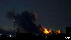 Oblak dima uzdiže se s mjesta napada u Teheranu 29. marta.