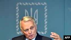 French Foreign Minister Jean-Marc Ayrault said Russia faces a "moment of truth" over its bombing campaign in Syria.