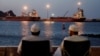 Vessels sit anchored in Muscat, Oman, on March 9.