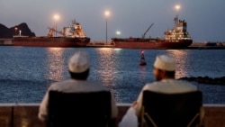 Vessels sit anchored in Muscat, Oman, on March 9.