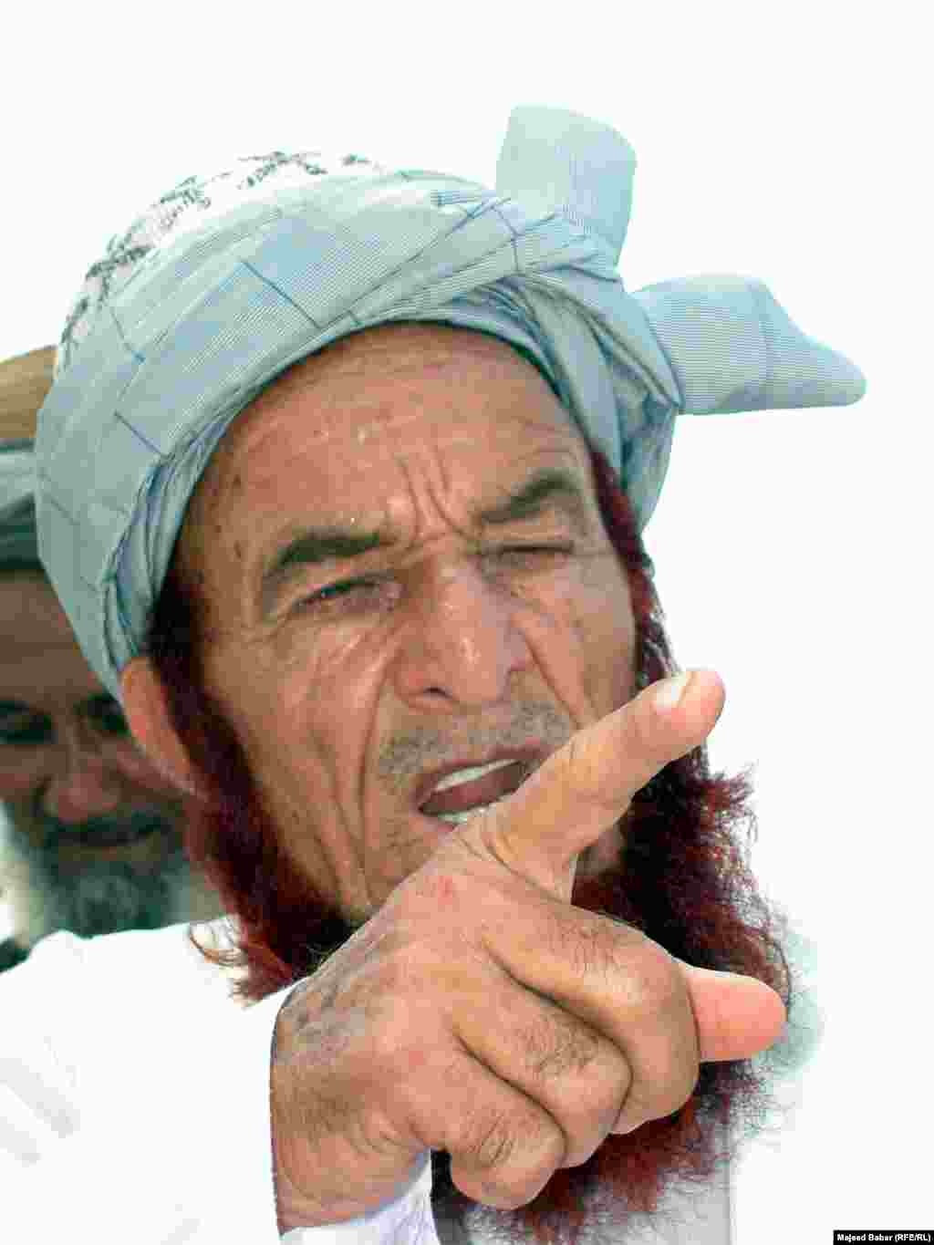 An Afridi tribal leader delivering his verdict after extensive deliberations.