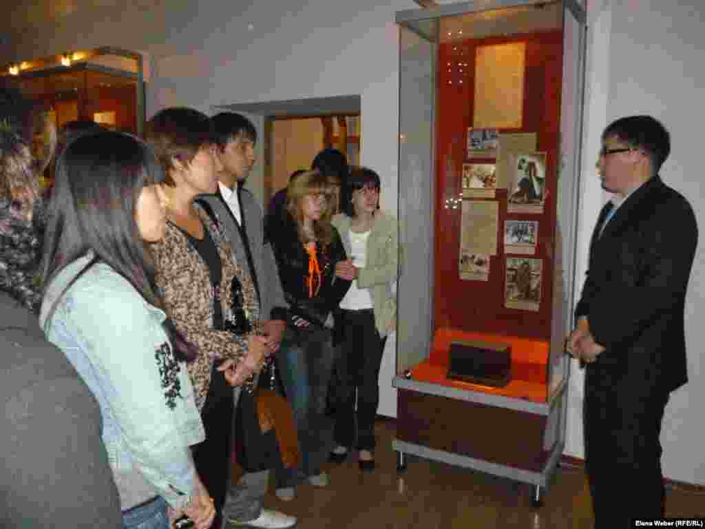 A guide tells visitors how people of different nationalities were deported to Kazakhstan from various parts of the Soviet Union in the years of repression.