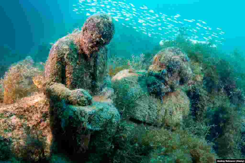 Lenin and Marx. Nekrasov says that after winter storms the statues can be found tumbled together.&nbsp;