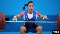 Russia's Nadezda Evstyukhina takes part in the weightlifting competition at the London Olympic Games in August 2012.