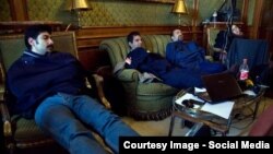 Switzerland--Radio Farda's Hannah Kaviani (far right) and fellow journalists sneak in some much needed sleep at the Iran nuclear talks. Lausanne, April 1, 2015.