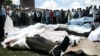 Dead bodies laid out after Uzbek forces opened fire on protestors in the city of Andijon in 2005.