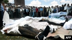 Dead bodies laid out after Uzbek forces opened fire on protestors in the city of Andijon in 2005.