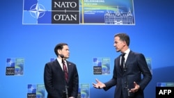 NATO Secretary General Mark Rutte (right) and US Secretary of State Marco Rubio talk at a NATO Foreign Ministers' meeting in Helsingborg, Sweden, on May 22.