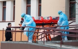 Эвакуация больного коронавирусом в Минске