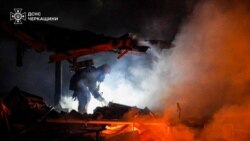 A firefighter works at a site of a Russian missile and drone strike in Ukraine's Cherkasy region on March 29, 2024. 