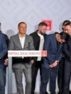 Candidatul PSD la Primăria Capitalei, Daniel Băluță (al doilea din stânga), flancat de președintele partidului, Sorin Grindeanu, secretarul general Claudiu Manda și prim-vicepreședintele Bogdan Gruia Ivan. 