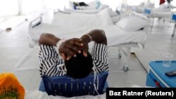 Pacijent zaražen koronom u improvizovanoj bolnici na stadionu Mačakos u Keniji, 24. jul 2020. 