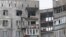 Зруйновані внаслідок обстрілу будинки. Маріуполь, 24 січня 2015 року