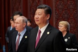 Владимир Путин и Си Цзиньпин на форуме в Пекине. 15 мая
