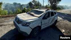 Російський fpv-дрон ударив по службовому автомобілю правоохоронців, який рухався по автодорозі у Воздвижівці Пологівського району 