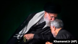 Iranian Supreme Leader Ayatollah Ali Khamenei kissing Qassem Soleimani during a religious ceremony in Tehran, September 19, 2018