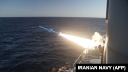 A handout photo made available by the Iranian Navy office on February 23, 2019, shows an Iranian Navy missile launch during a military drill in the Gulf of Oman.