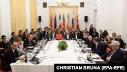 Members of the Joint Commission of the Joint Comprehensive Plan of Action (JCPOA) attend a ministerial meeting at the Palais Coburg, in Vienna, Austria, 06 July 2018. 