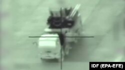 An alleged Syrian missile launcher is targeted by an Israeli air strike, at an undisclosed location in Syria, May 10, 2018. Grab from a video released by IDF. File photo