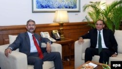 Indian Foreign Secretary S. Jaishankar, left, meets with Pakistani Foreign Secretary Aizaz Ahmad Chaudhry prior to a meeting in New Delhi, on April 26.