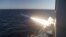 A handout photo made available by the Iranian Navy office on February 23, 2019, shows an Iranian Navy missile launch during a military drill in the Gulf of Oman.