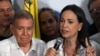 Lidera opoziției, Maria Corina Machado, la o conferință de presă la Caracas, luni dimineață, în compania candidatului prezidențial Edmundo Gonzalez Urrutia. 