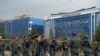 AFGHANISTAN -- Afghan policemen keep watch at the site of a sucide attack outside a wedding hall in Kabul, November 16, 2017