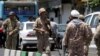 Members of the Iranian Revolutionary Guard secure the area outside the Iranian parliament during an attack on the complex in the capital Tehran, June 7, 2017