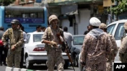 Members of the Iranian Revolutionary Guard secure the area outside the Iranian parliament during an attack on the complex in the capital Tehran, June 7, 2017